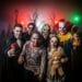 Visitors enjoying haunted houses and scare zones at Halloween Horror Nights event