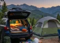 Beginner car camping setup with vehicle, camping gear, and outdoor campsite